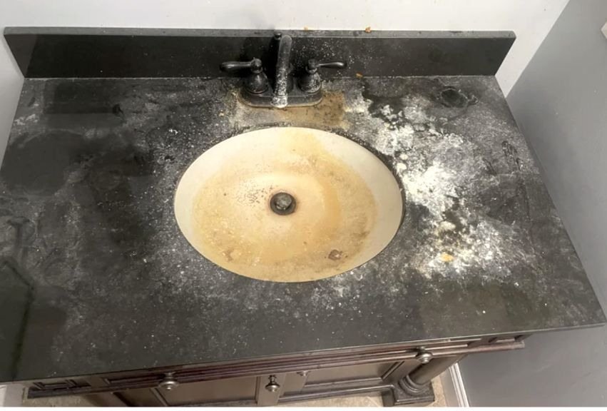 Bathroom vanity reset before Bright Path cleaning