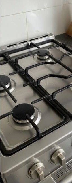 Gas stovetop detail after Bright Path cleaning
